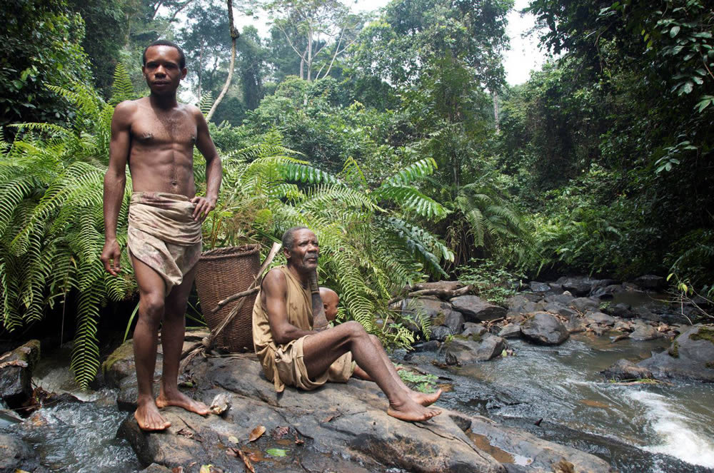Men sitting on rocks